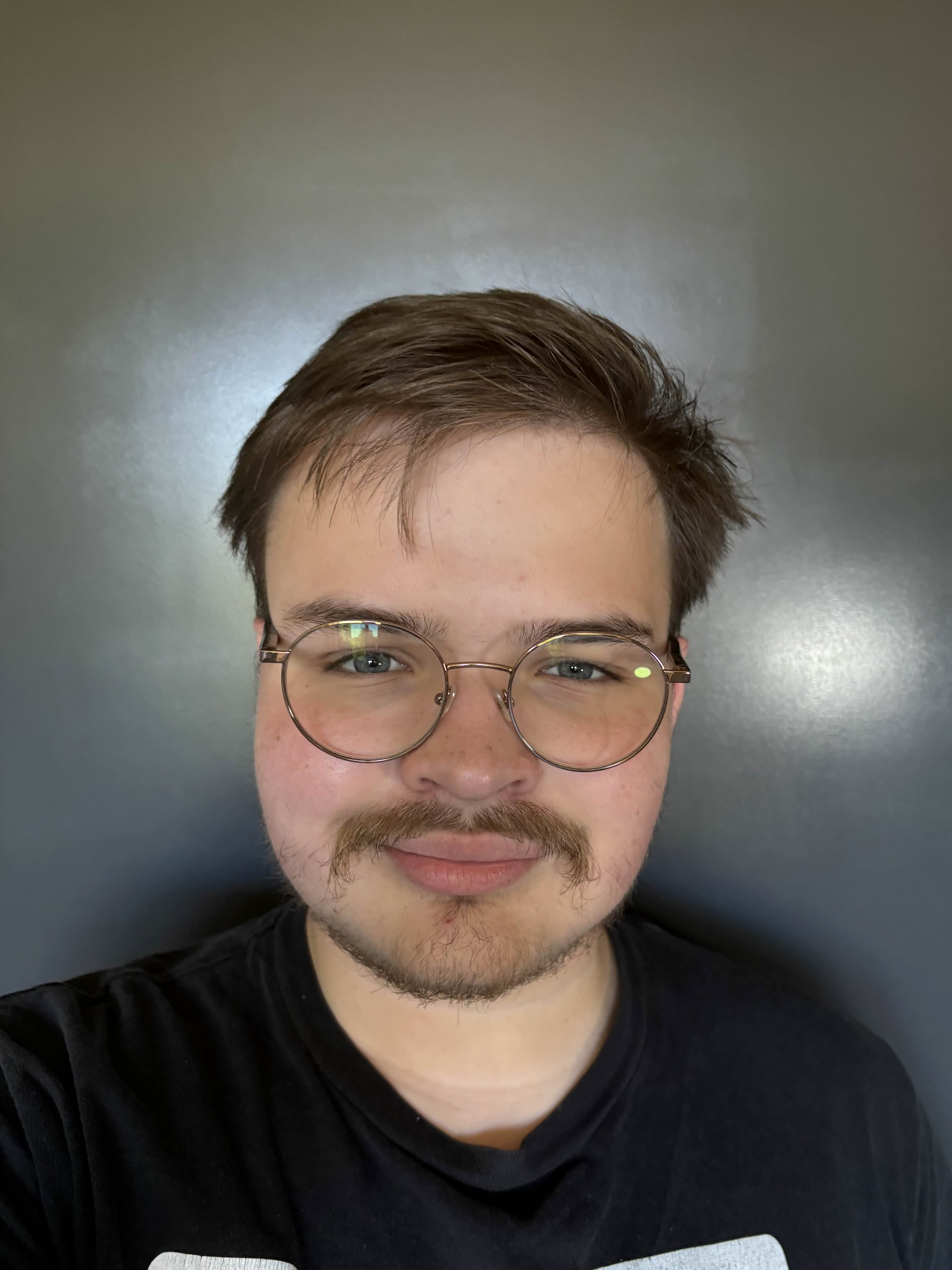 Headshot of Arthur